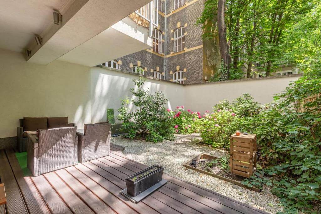 A quiet garden apartment with a patio